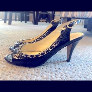 Authentic CHANEL black patent leather sling backs